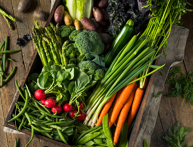 Crate of carrots, radishes, and beans