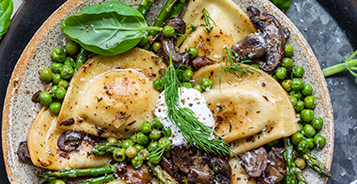 Pierogies with Asparagus and Creamy Mushroom Sauce
