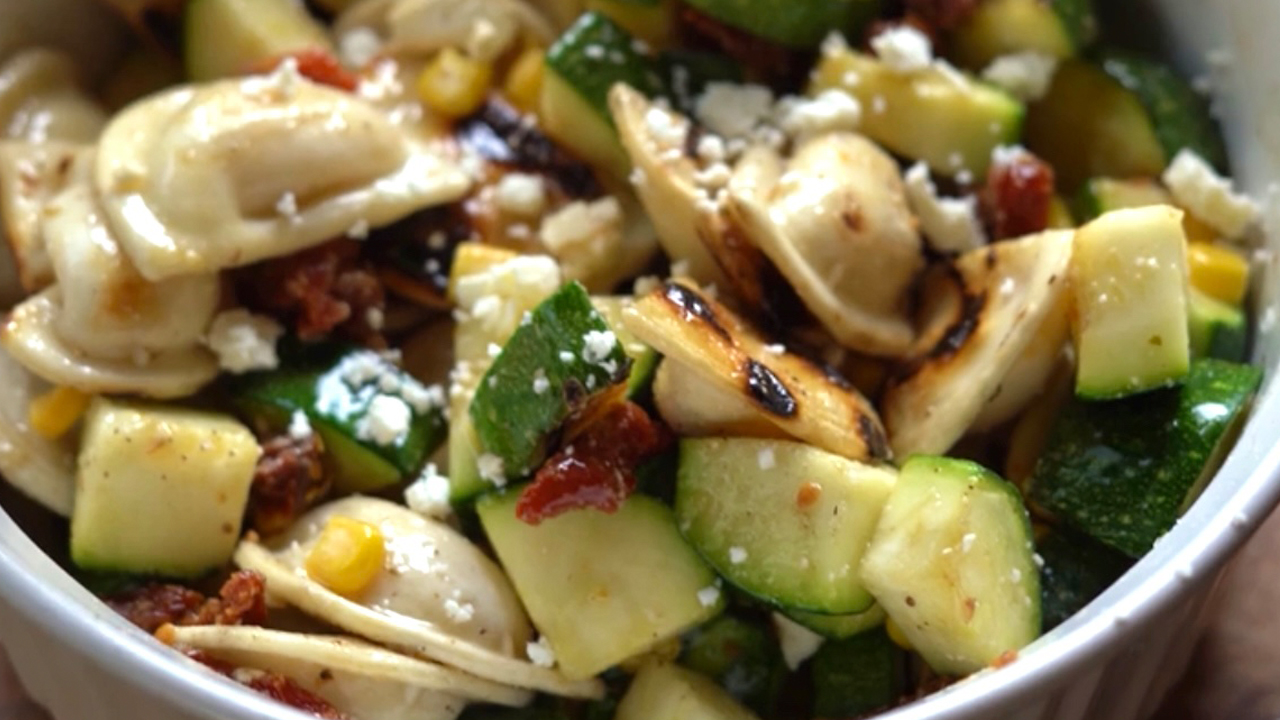 Pierogy Pasta Salad w/ Shaved Corn, Feta Cheese, Sun-Dried Tomatoes, & Seasonal Vinaigrette