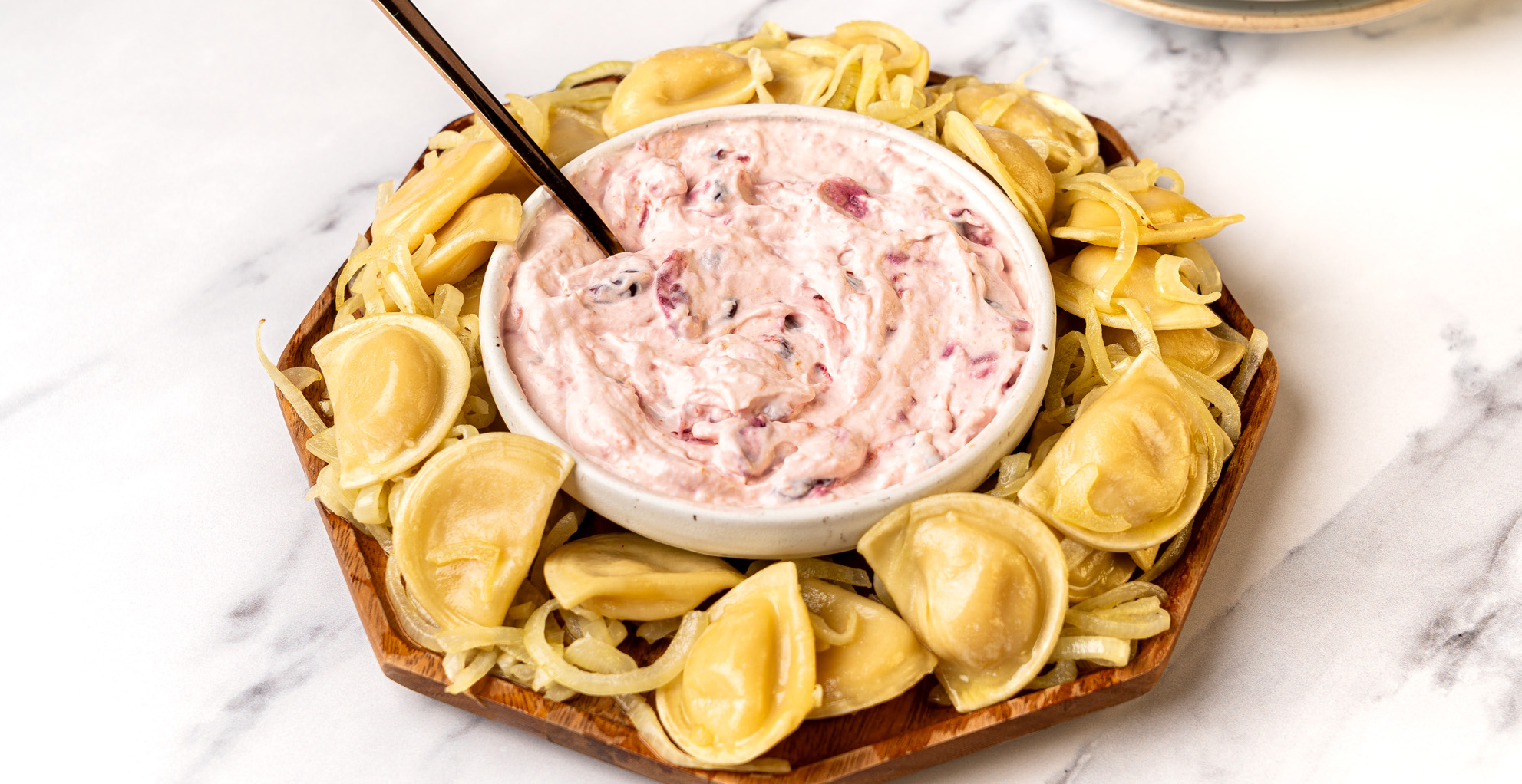 Baked Pierogies and Onions with Cranberry Sour Cream