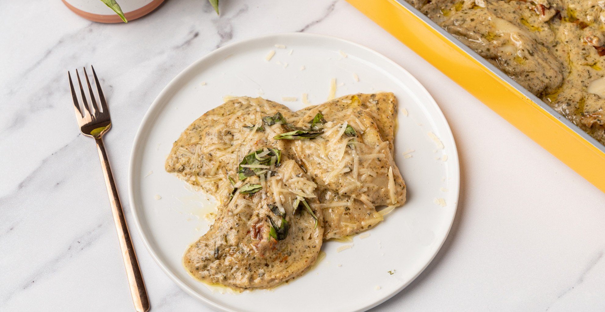 Creamy Pesto and Sun-Dried Tomato Pierogy Bake